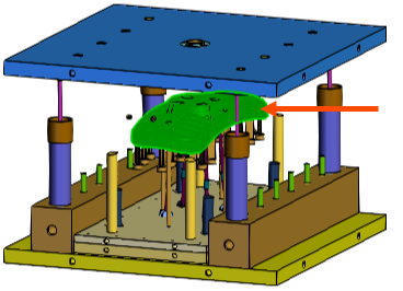 A mold with an arrow indicating the plastic part.